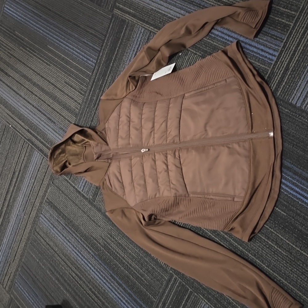 Women's Tek Gear hooded mixed - media jacket.